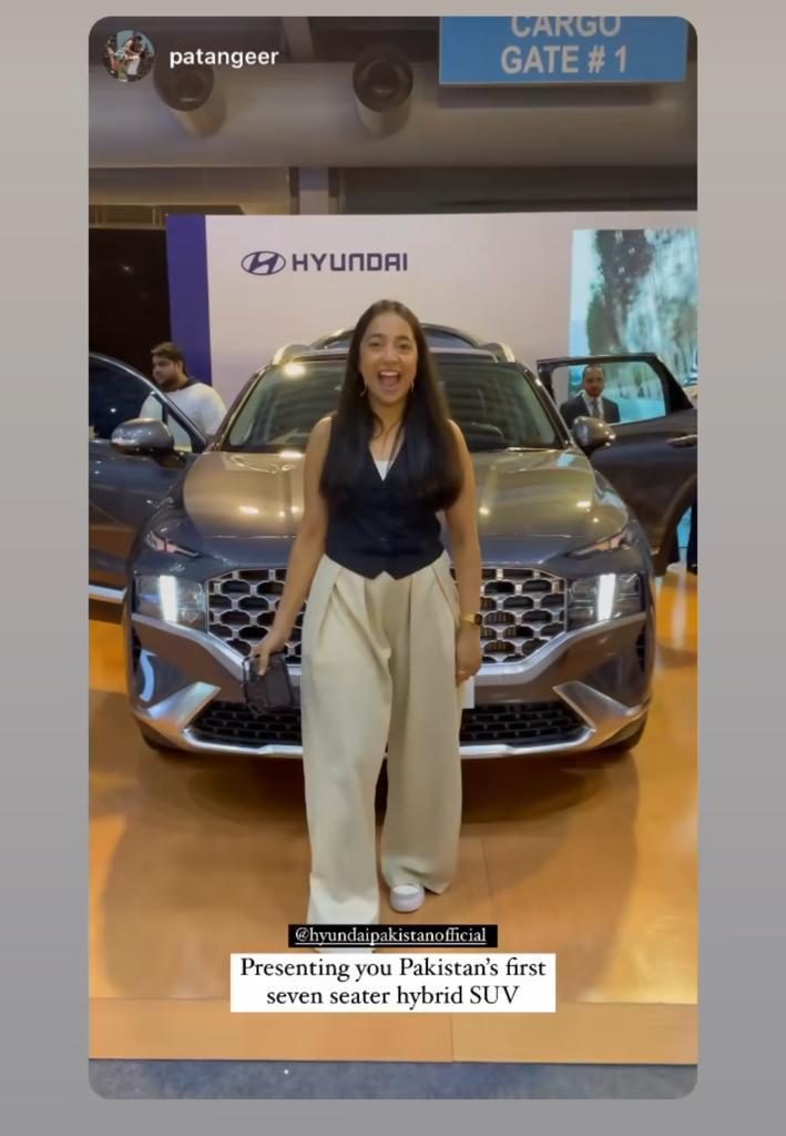 Instagram creator presenting Pakistan's first seven-seater hybrid SUV at the launch